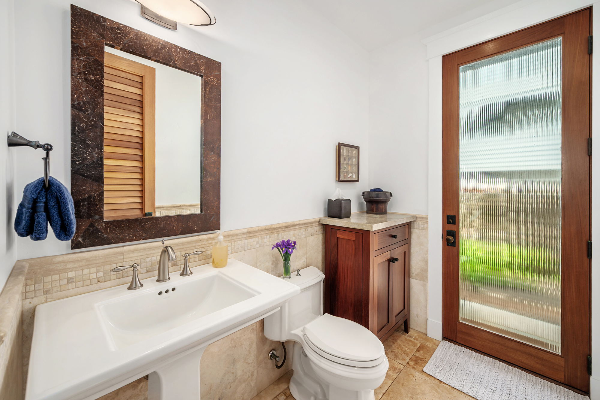 5070 Kukuna Road Kilauea, HI 96754 - Photo 20 of 29 a bathroom with a sink a toilet and a mirror