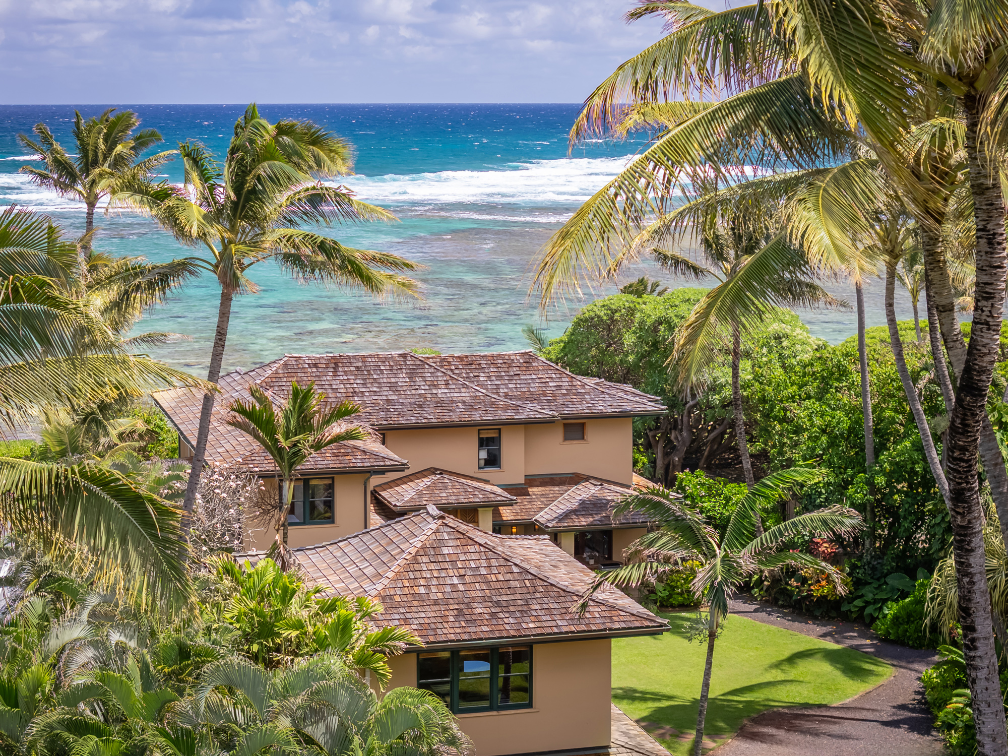 5070 Kukuna Road Kilauea, HI 96754 - Photo 28 of 29 a view of a palm trees in front of a house