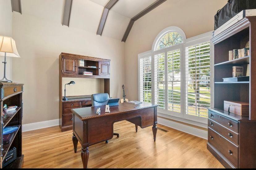 802 Morningwood Lane Northwest Kennesaw, GA 30152 - Photo 7 of 13 a work room with furniture and a window