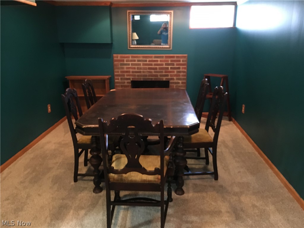 1672 Rushton Road Cleveland, OH 44121 - Photo 8 of 24 Finished basement offers spacious living for entertaining.