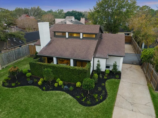 a view of a front of house and sign board