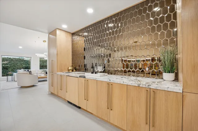 a bathroom with a double vanity sink and mirror