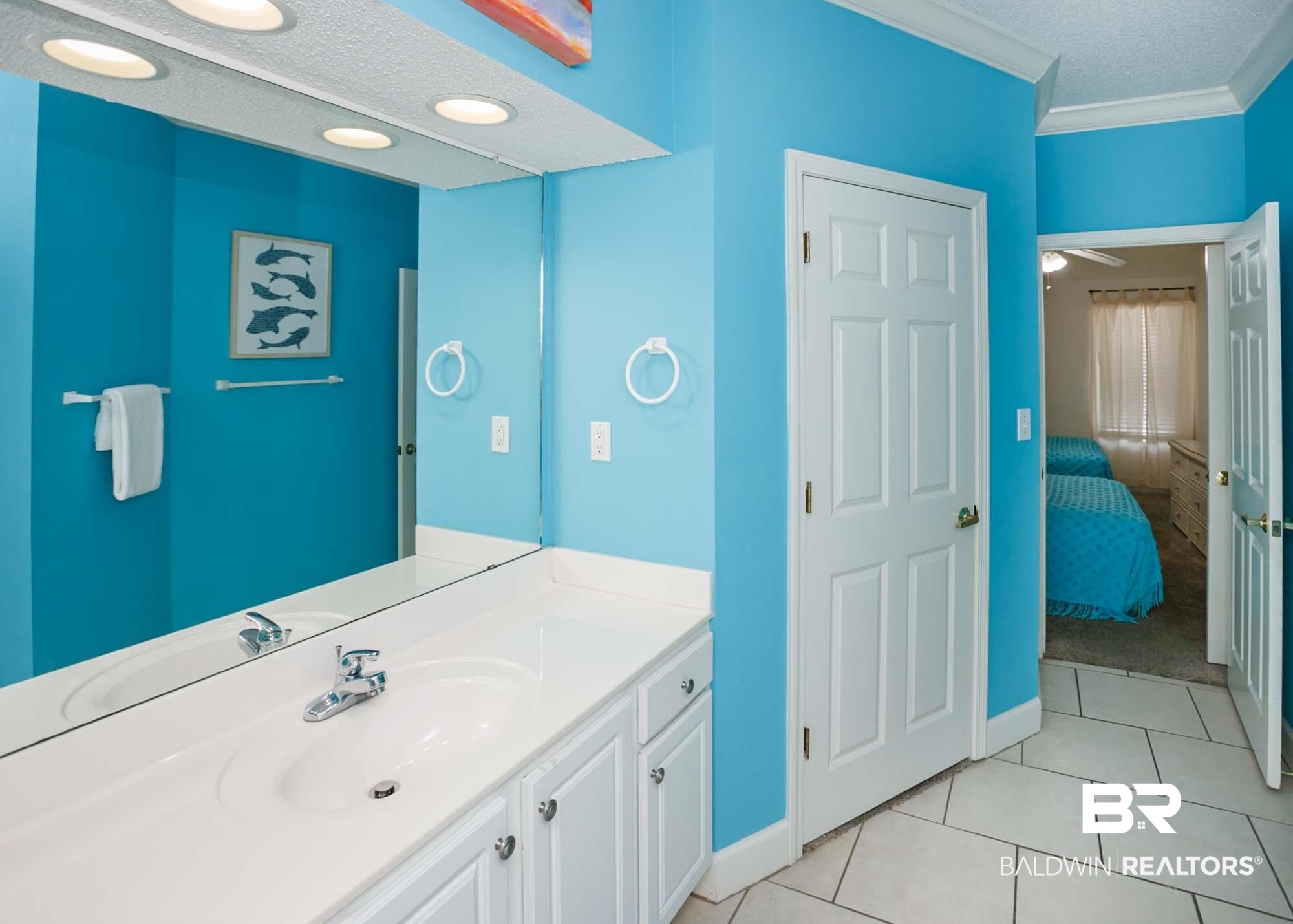 28910 Perdido Beach Boulevard, Unit 4B Orange Beach, AL 36561 - Photo 39 of 48 Ensuite bathroom featuring a textured ceiling, crown molding, ceiling fan, vanity, and tile patterned flooring