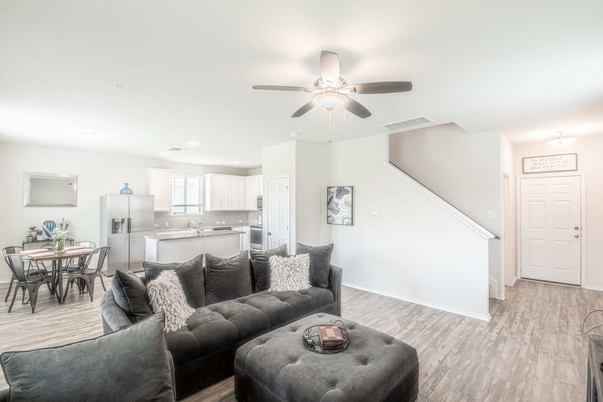 192 Spotted Rail Ridge Leander, TX 78641 - Photo 33 of 34 a living room with furniture and a wooden floor