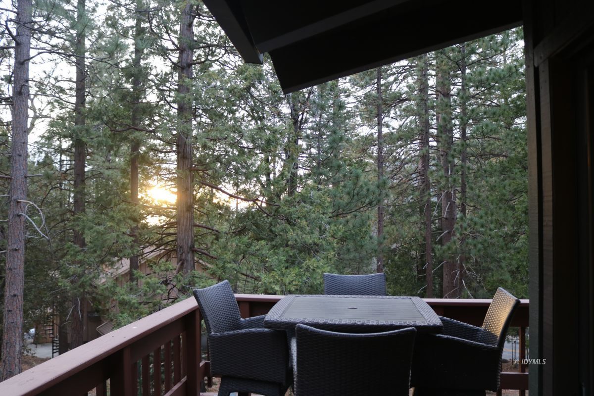 24796 Fern Valley Road Idyllwild, CA 92549 - Photo 5 of 20 a view of a patio with a table