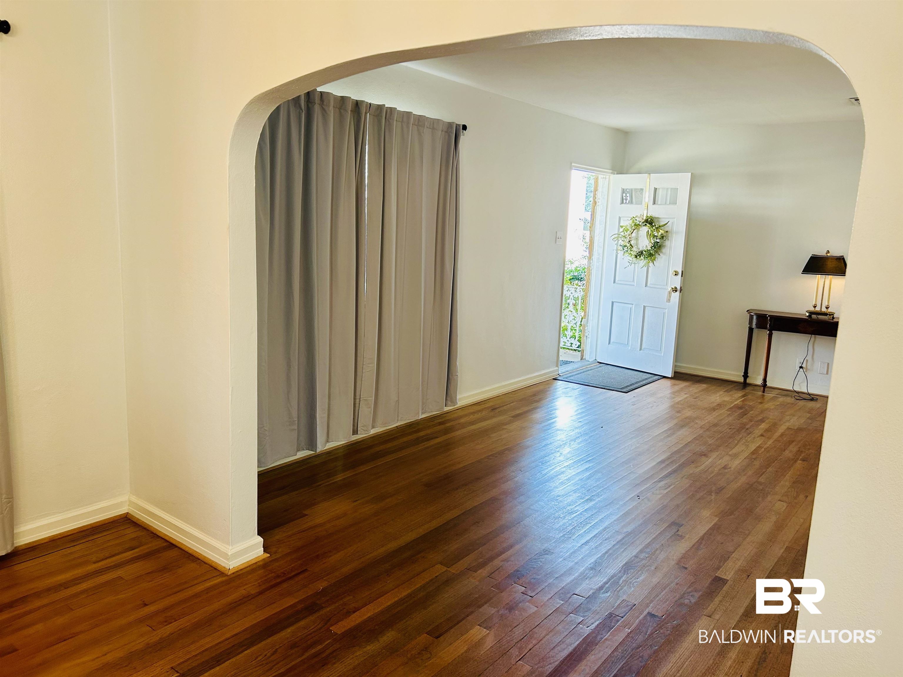 94 Diamond Street Mobile, AL 36611 - Photo 9 of 30 Foyer entrance featuring dark hardwood / wood-style floors