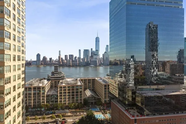 a view of a city with tall buildings