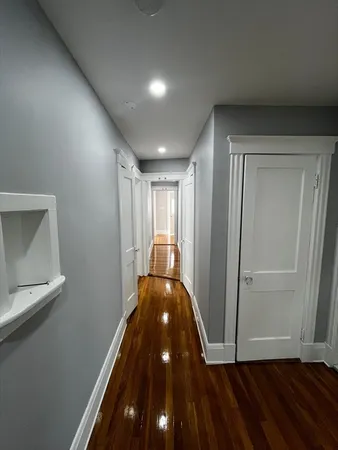 a view of entryway with wooden floor