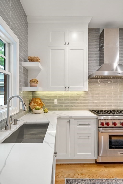 30 Naples Road, Unit 1 Brookline, MA 02446 - Photo 4 of 28 a kitchen with a sink and a stove