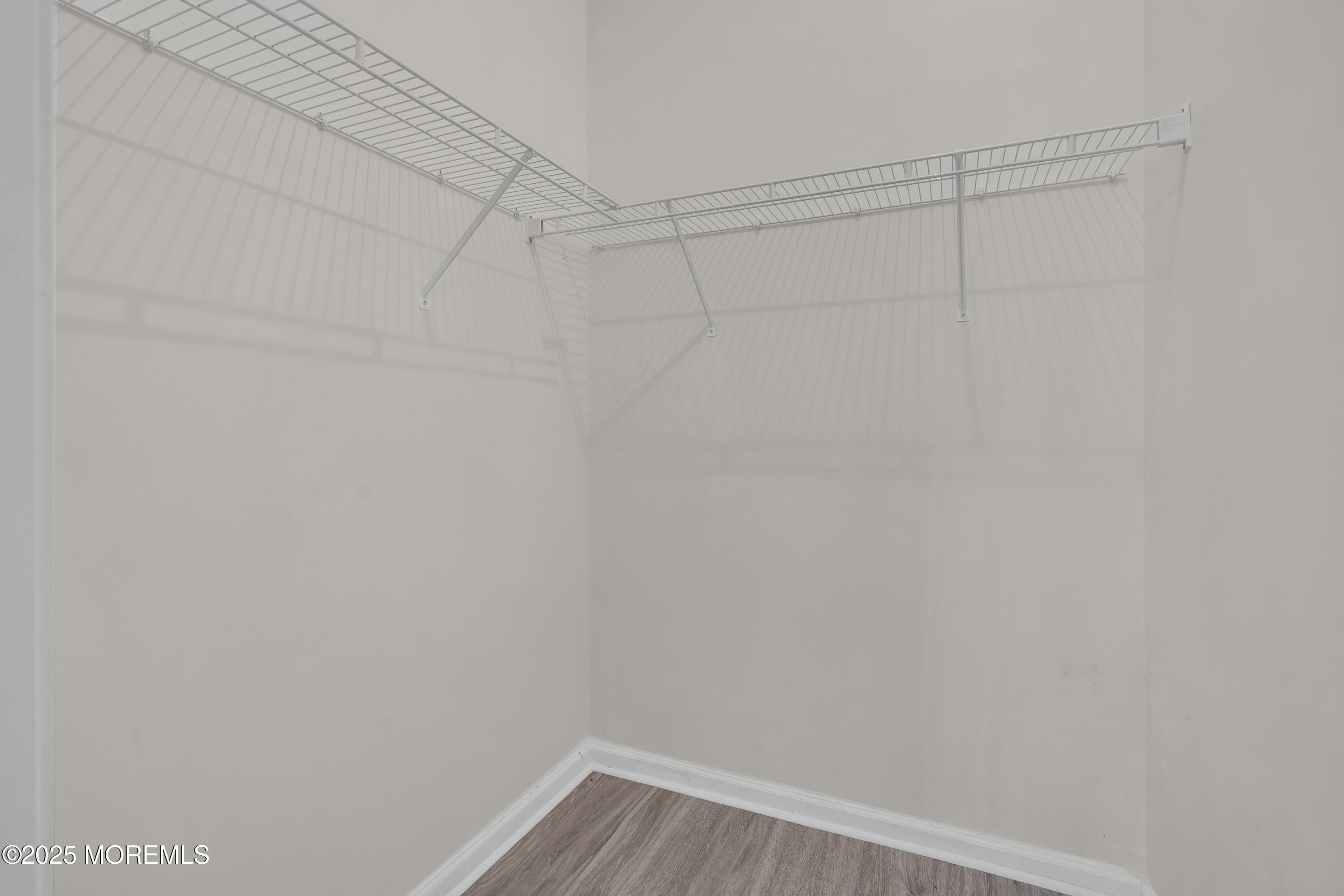 32 Riva Boulevard, Unit 2277 Brick, NJ 08723 - Photo 14 of 23 a view of a room with racks on the wall
