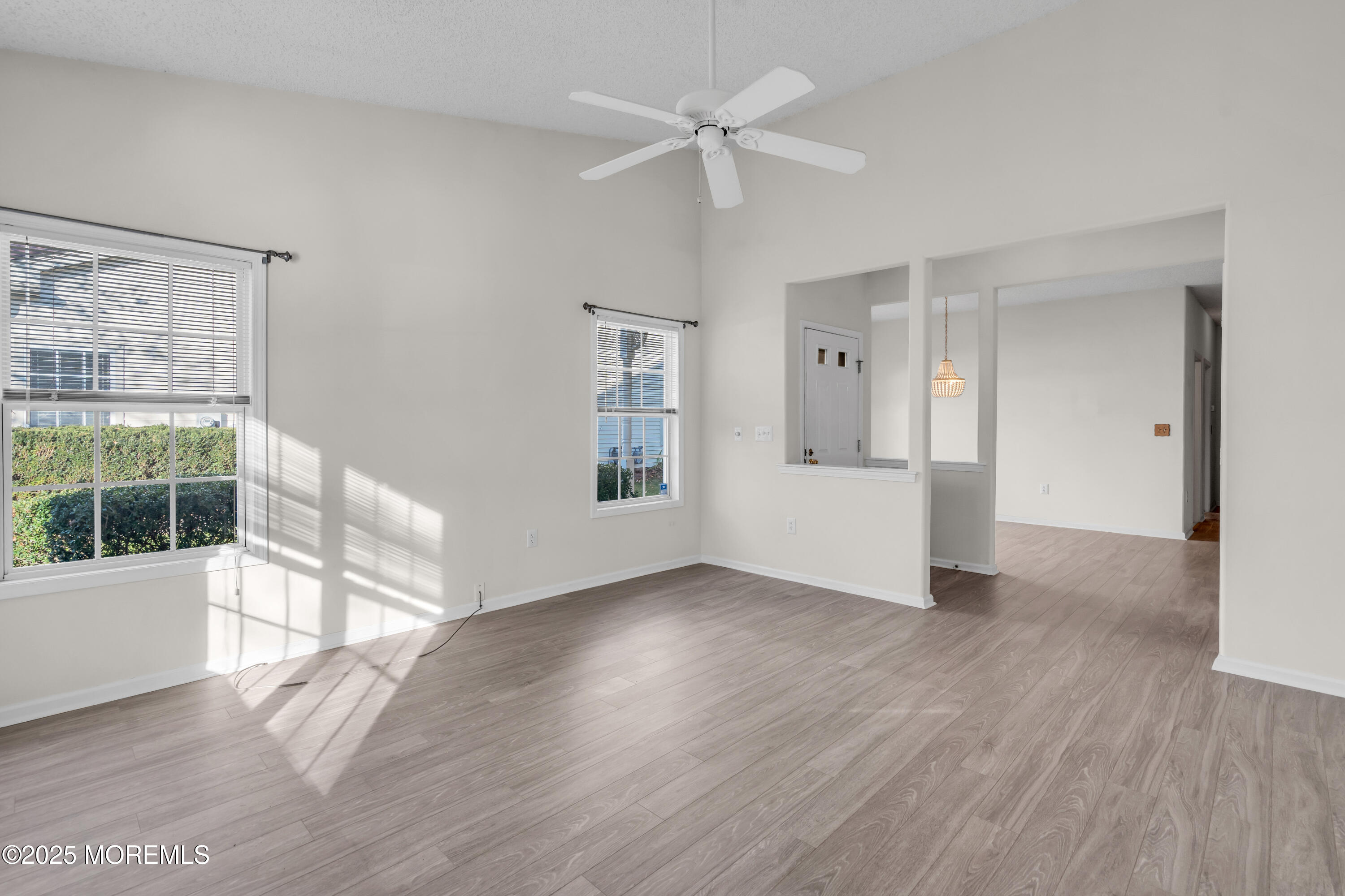 32 Riva Boulevard, Unit 2277 Brick, NJ 08723 - Photo 5 of 23 a view of empty room with wooden floor and fan