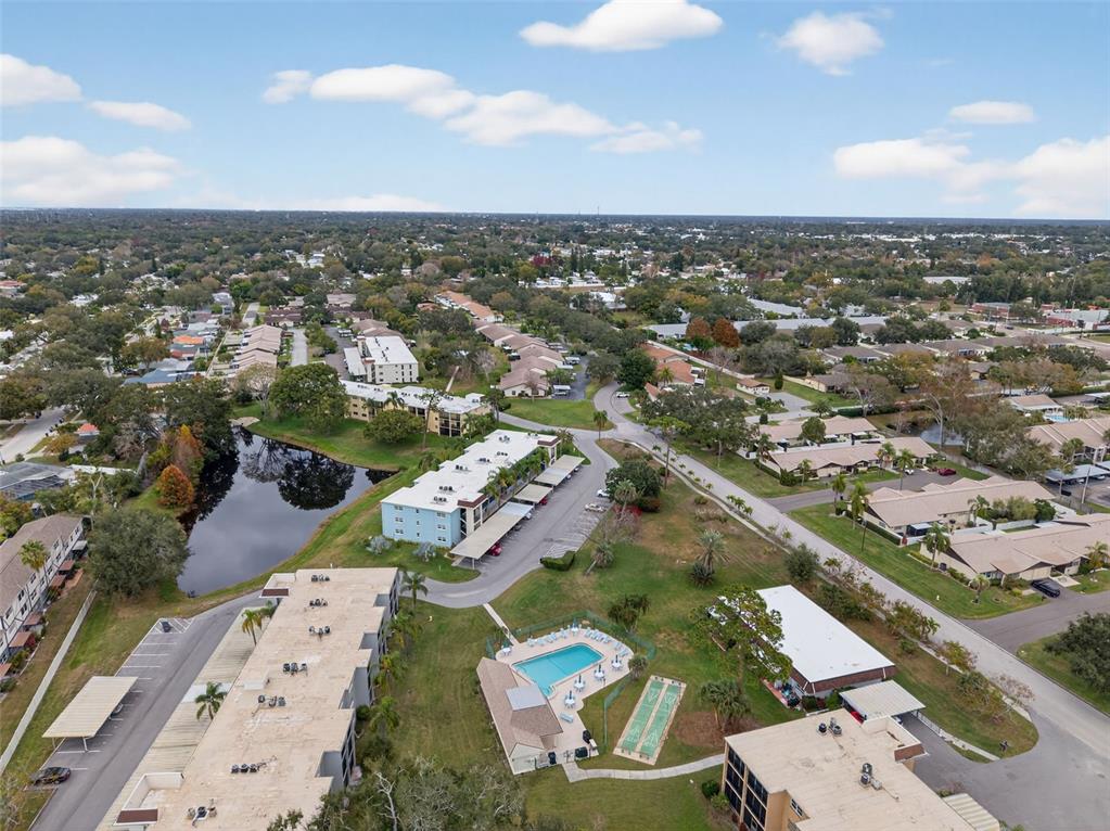 1430 Heather Ridge Boulevard, Unit 101 Dunedin, FL 34698 - Photo 40 of 44 an aerial view of a city