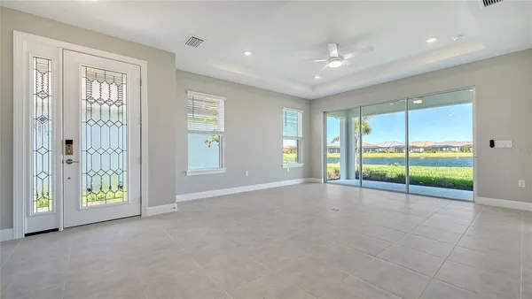 a view of an empty room with a sliding door