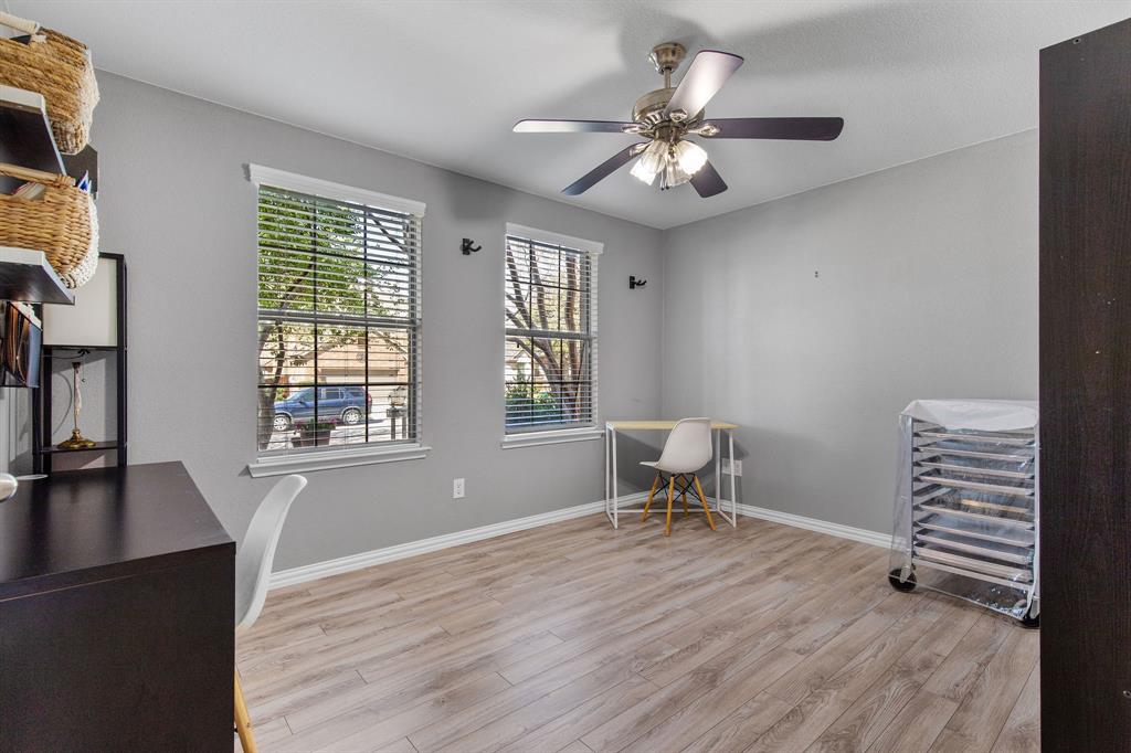 3213 Evening Wind Road Denton, TX 76208 - Photo 3 of 28 a view of a livingroom with furniture and a window