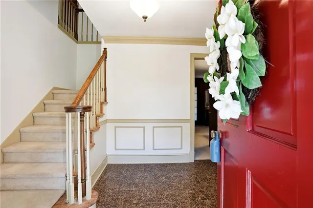 a view of entryway with wooden floor