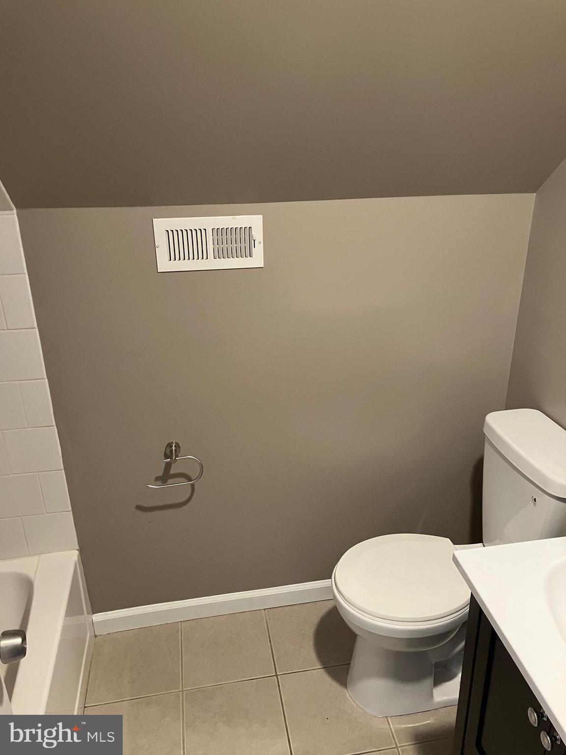 15 Blueberry Lane Willingboro, NJ 08046 - Photo 12 of 14 a white toilet sitting next to a shower