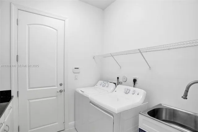 a bathroom with a sink and mirror