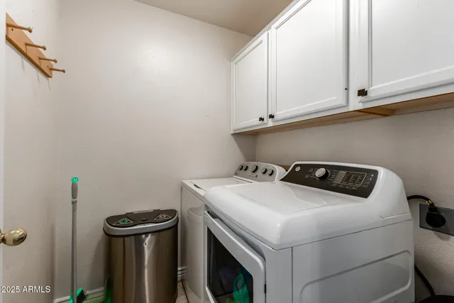 a swimming pool with outdoor seating