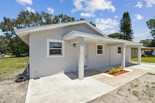 a house view with a garden space