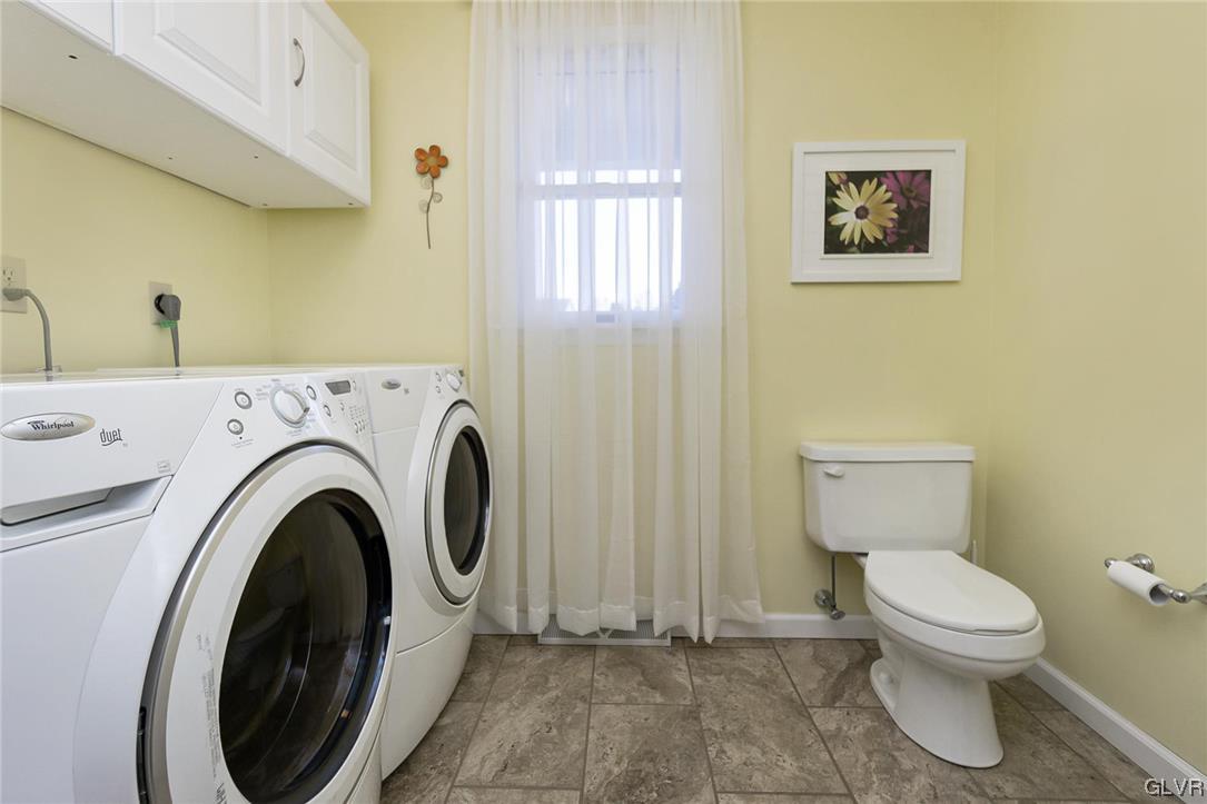 1163 Marfield Drive Nazareth, PA 18064 - Photo 14 of 46 a view of a bathroom with a toilet and a sink
