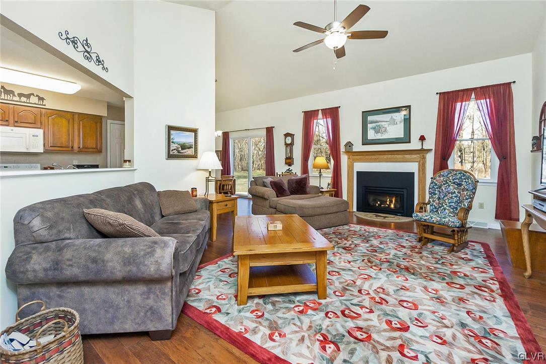 1163 Marfield Drive Nazareth, PA 18064 - Photo 17 of 46 a living room with furniture and a fireplace