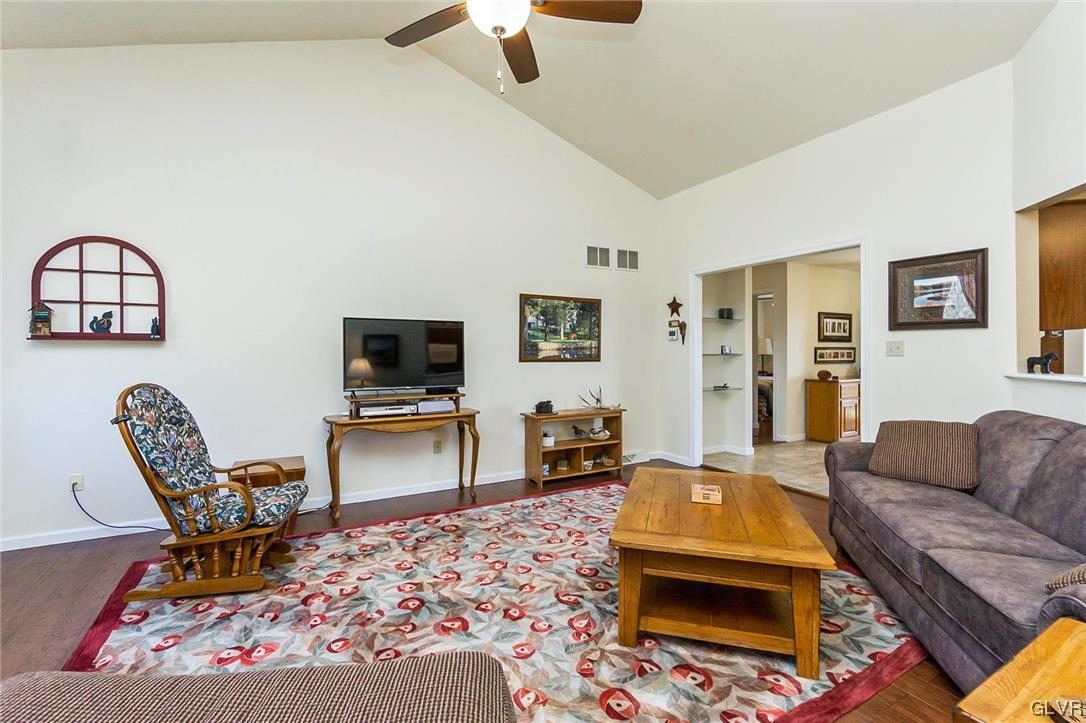 1163 Marfield Drive Nazareth, PA 18064 - Photo 18 of 46 a living room with furniture and a flat screen tv