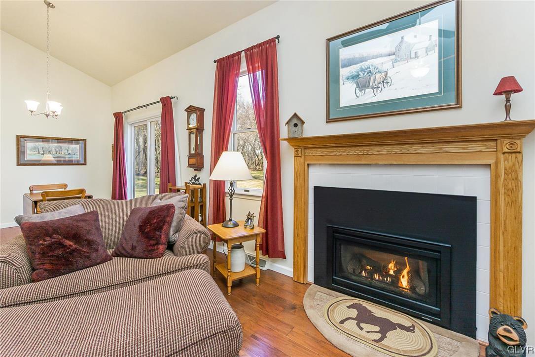 1163 Marfield Drive Nazareth, PA 18064 - Photo 19 of 46 a living room with furniture and a fireplace