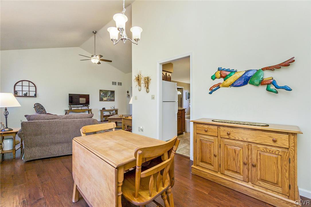 1163 Marfield Drive Nazareth, PA 18064 - Photo 30 of 46 a view of a dining room with furniture and wooden floor