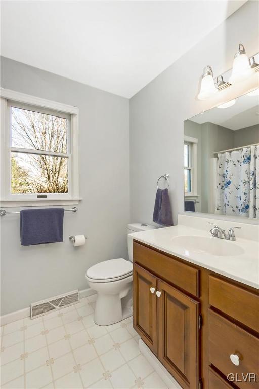1163 Marfield Drive Nazareth, PA 18064 - Photo 36 of 46 a bathroom with a sink vanity mirror and toilet