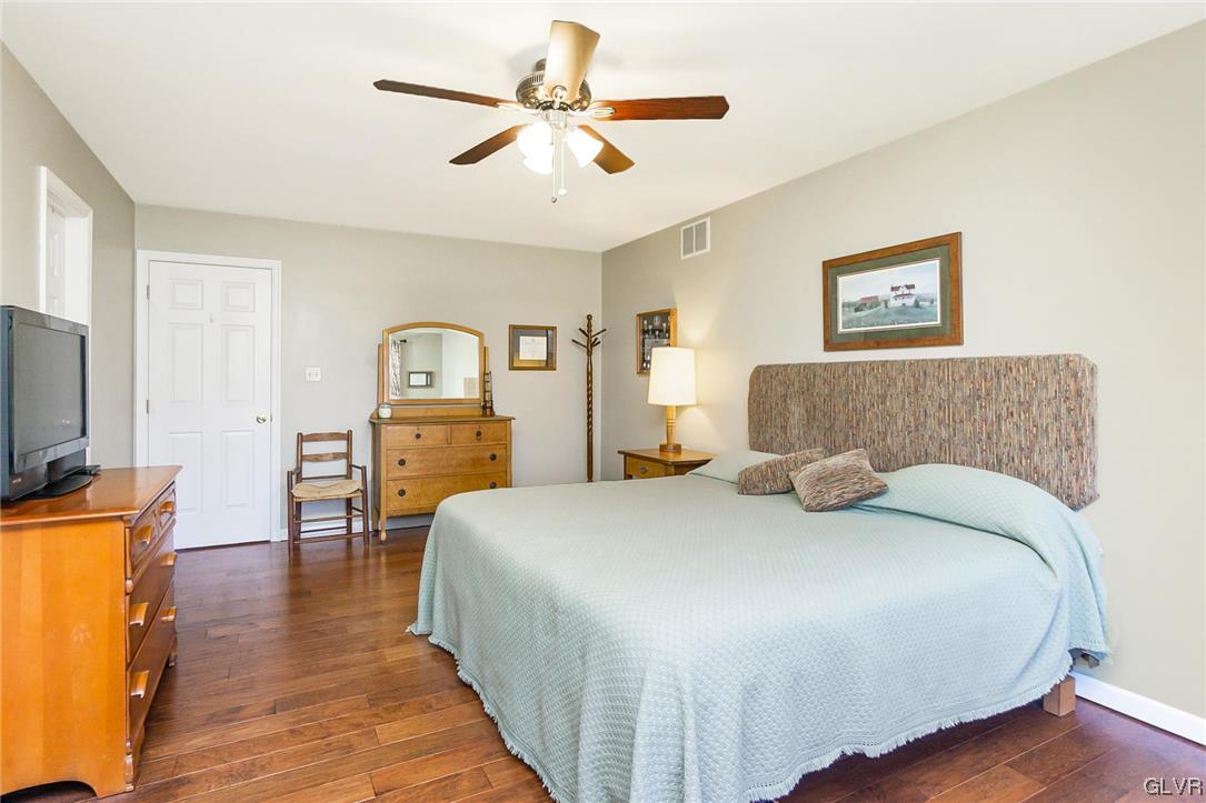 1163 Marfield Drive Nazareth, PA 18064 - Photo 39 of 46 a bedroom with a bed and a flat screen tv