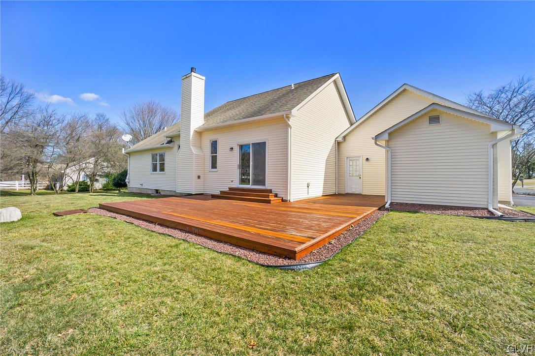 1163 Marfield Drive Nazareth, PA 18064 - Photo 4 of 46 a backyard of a house with table and chairs