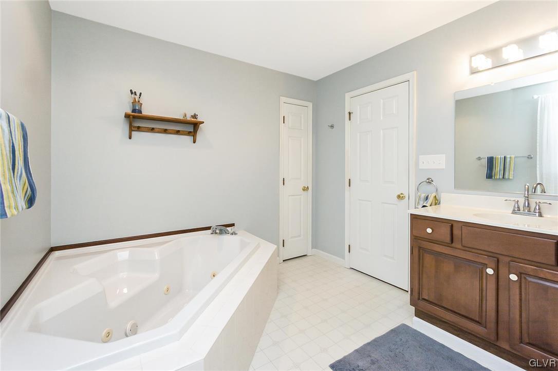 1163 Marfield Drive Nazareth, PA 18064 - Photo 42 of 46 a bathroom with a bathtub and a sink