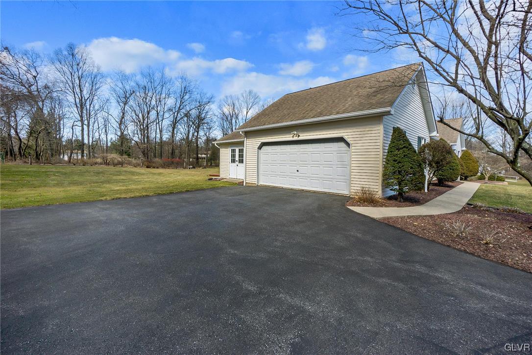 1163 Marfield Drive Nazareth, PA 18064 - Photo 5 of 46 a view of a house with backyard and trees