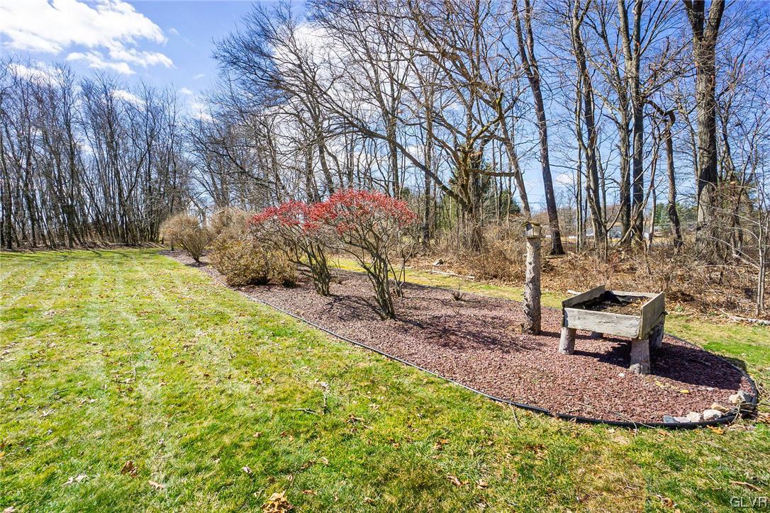 1163 Marfield Drive Nazareth, PA 18064 - Photo 9 of 46 a sign board with tall trees