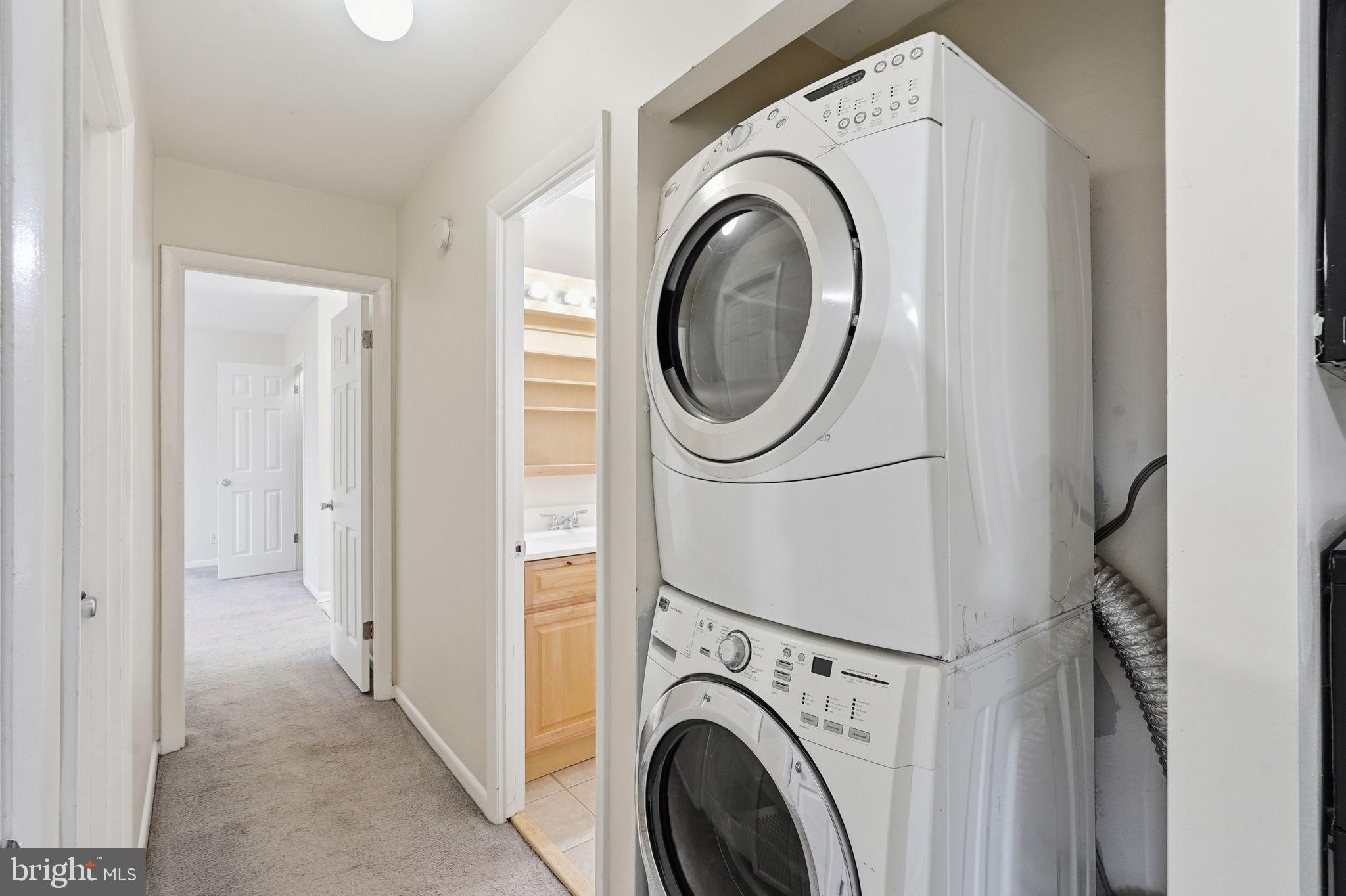 6230 Edsall Road, Unit 403 Alexandria, VA 22312 - Photo 15 of 17 a utility room with dryer and washer