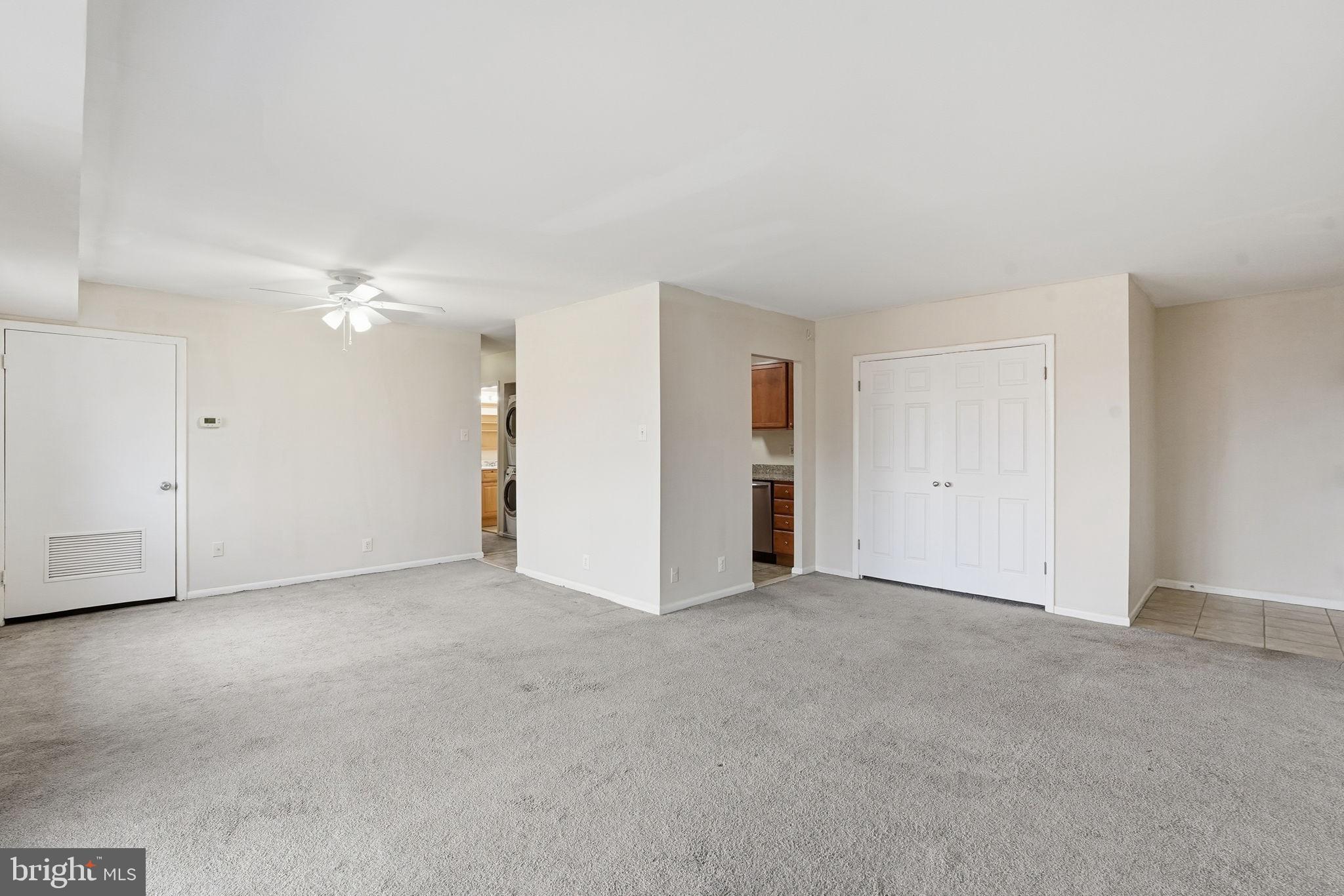 6230 Edsall Road, Unit 403 Alexandria, VA 22312 - Photo 4 of 18 an empty room with an entryway and closet area