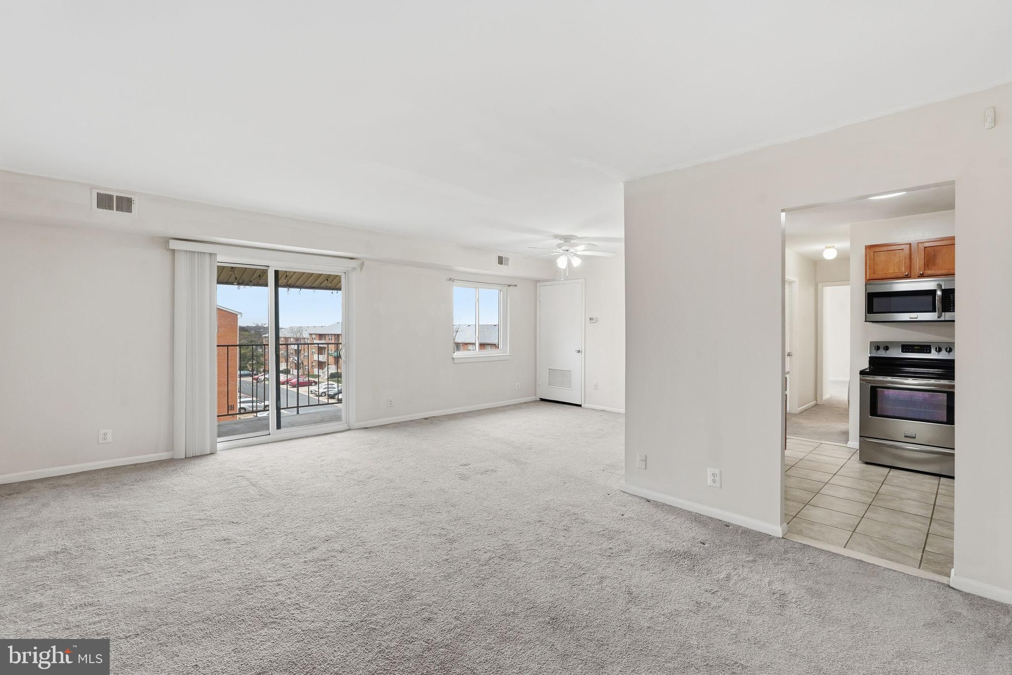 6230 Edsall Road, Unit 403 Alexandria, VA 22312 - Photo 5 of 18 a view of an empty room with a window