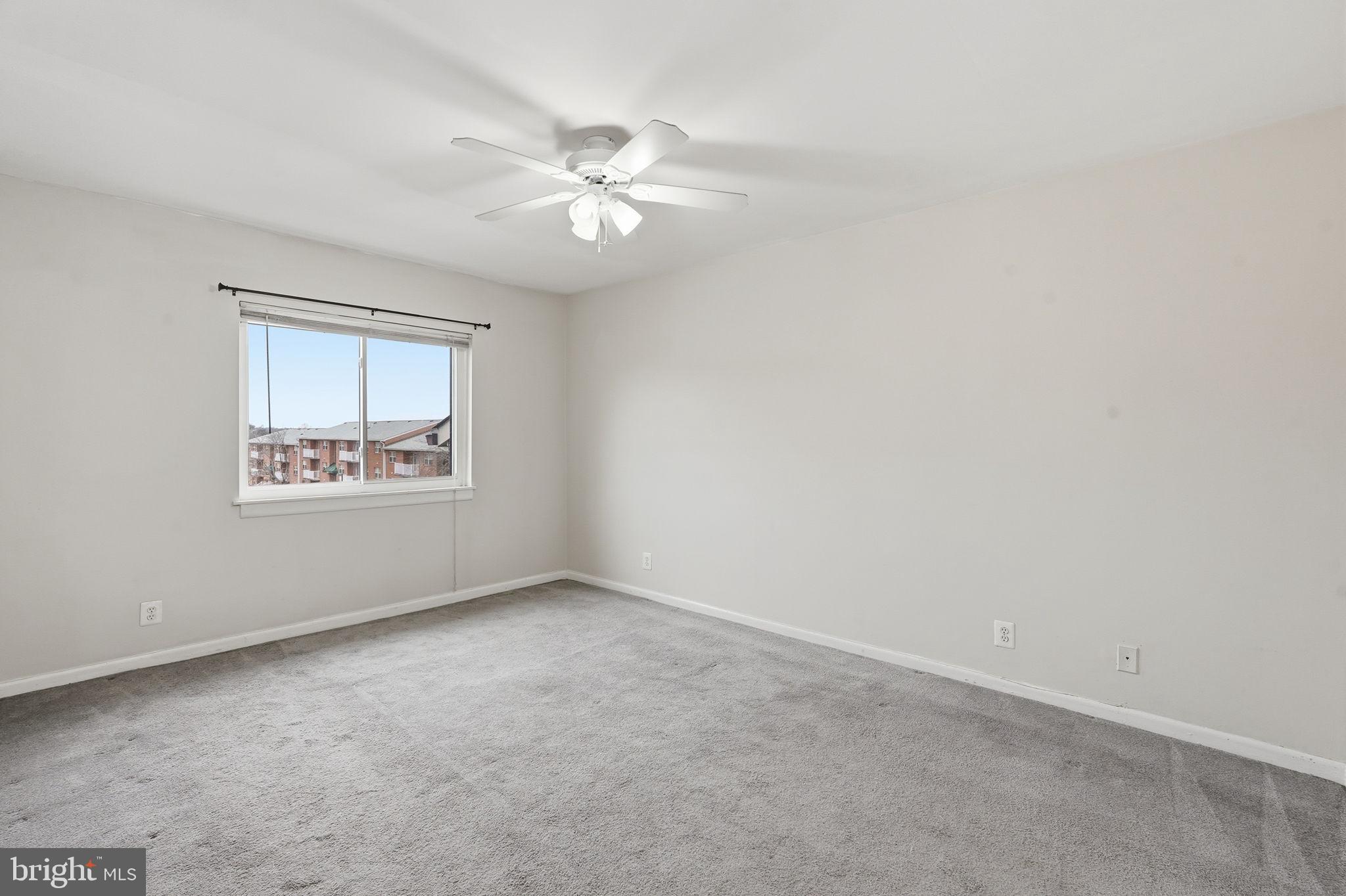 6230 Edsall Road, Unit 403 Alexandria, VA 22312 - Photo 7 of 18 a view of an empty room with a window