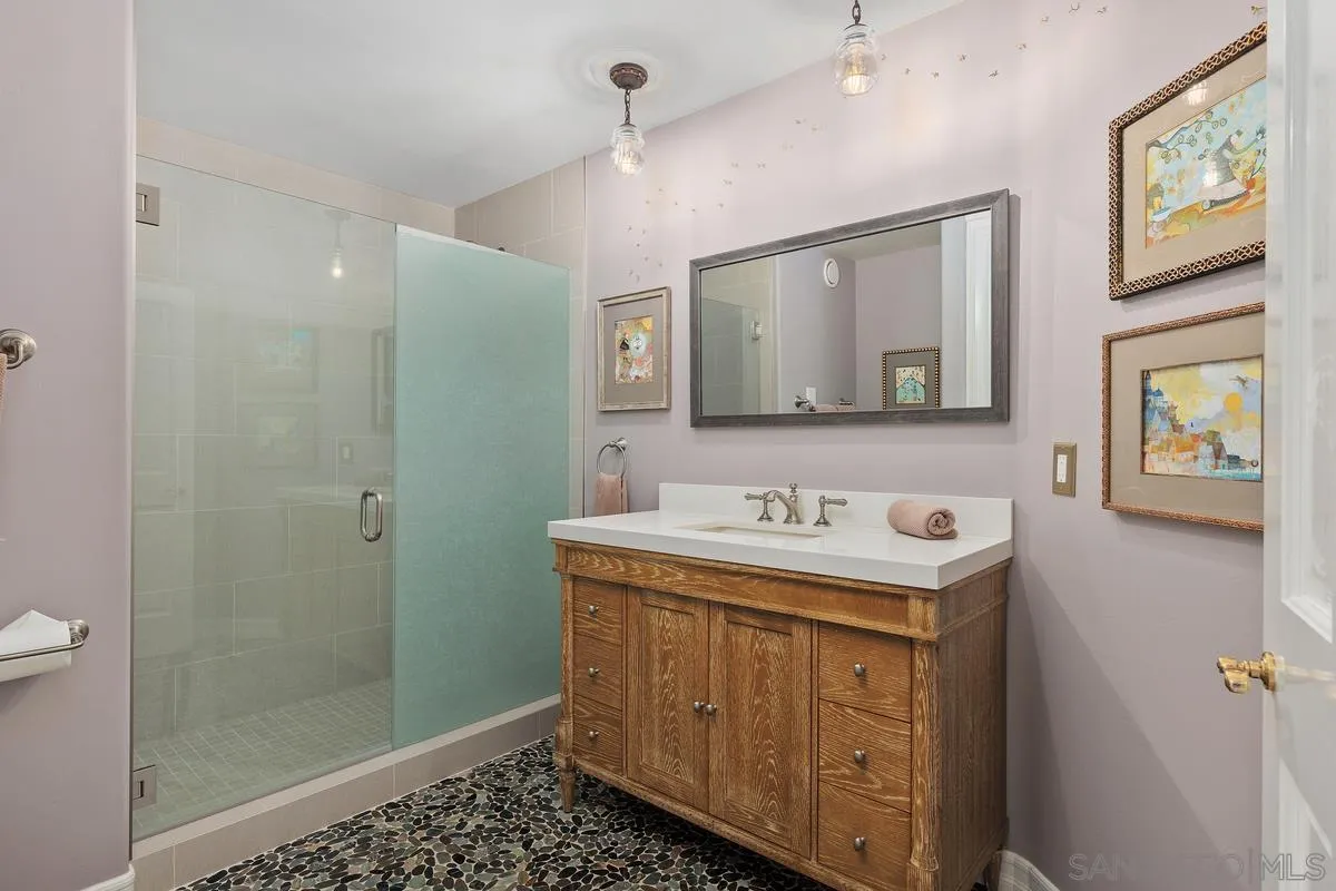 390 East Glaucus Street Encinitas, CA 92024 - Photo 15 of 25 a bathroom with a sink a vanity and a mirror