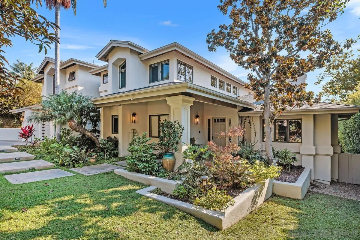 390 East Glaucus Street Encinitas, CA 92024 - Photo 20 of 25 a front view of a house with garden