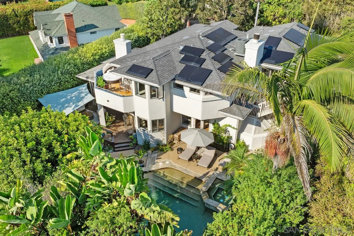 390 East Glaucus Street Encinitas, CA 92024 - Photo 4 of 25 an aerial view of a house with a garden