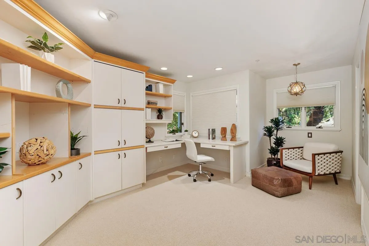 390 East Glaucus Street Encinitas, CA 92024 - Photo 9 of 25 a living room with furniture and a table