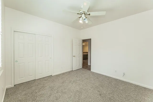 a view of a balcony with furniture