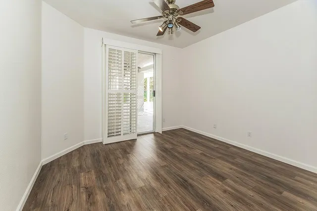 a view of a house with swimming pool and porch with furniture