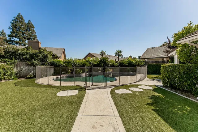 an aerial view of a swimming pool