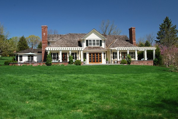 55 Estabrook Road Concord, MA 01742 - Photo 17 of 18 a front view of a house with a yard