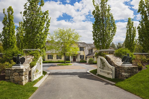 55 Estabrook Road Concord, MA 01742 - Photo 3 of 18 a view of a street with houses on both side