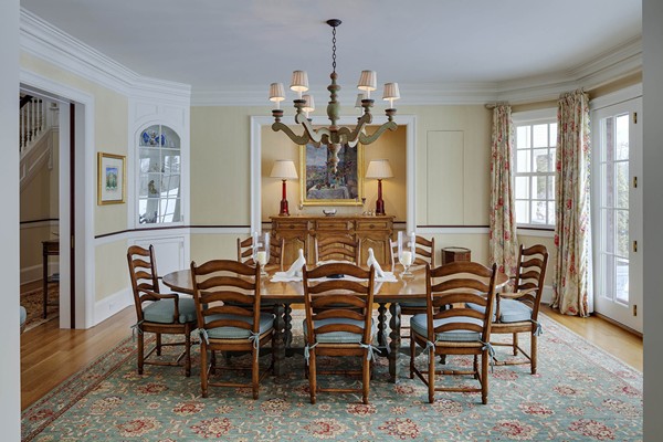 55 Estabrook Road Concord, MA 01742 - Photo 6 of 18 a view of a dining room with furniture and chandelier