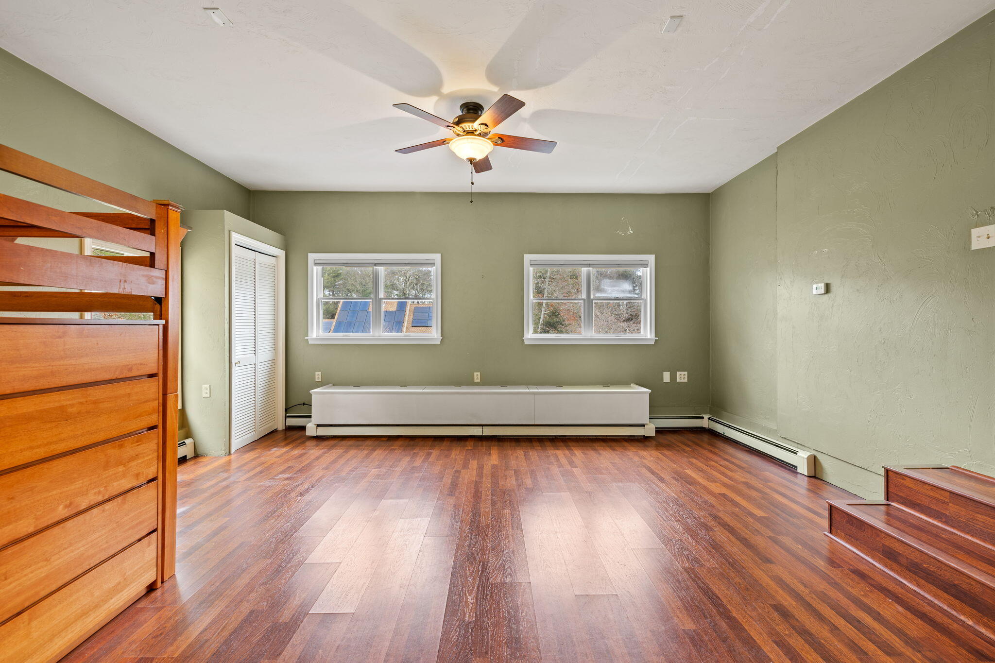 21 Heather Hill Road Buzzards Bay, MA 02532 - Photo 11 of 32 wooden floor in an empty room with a window