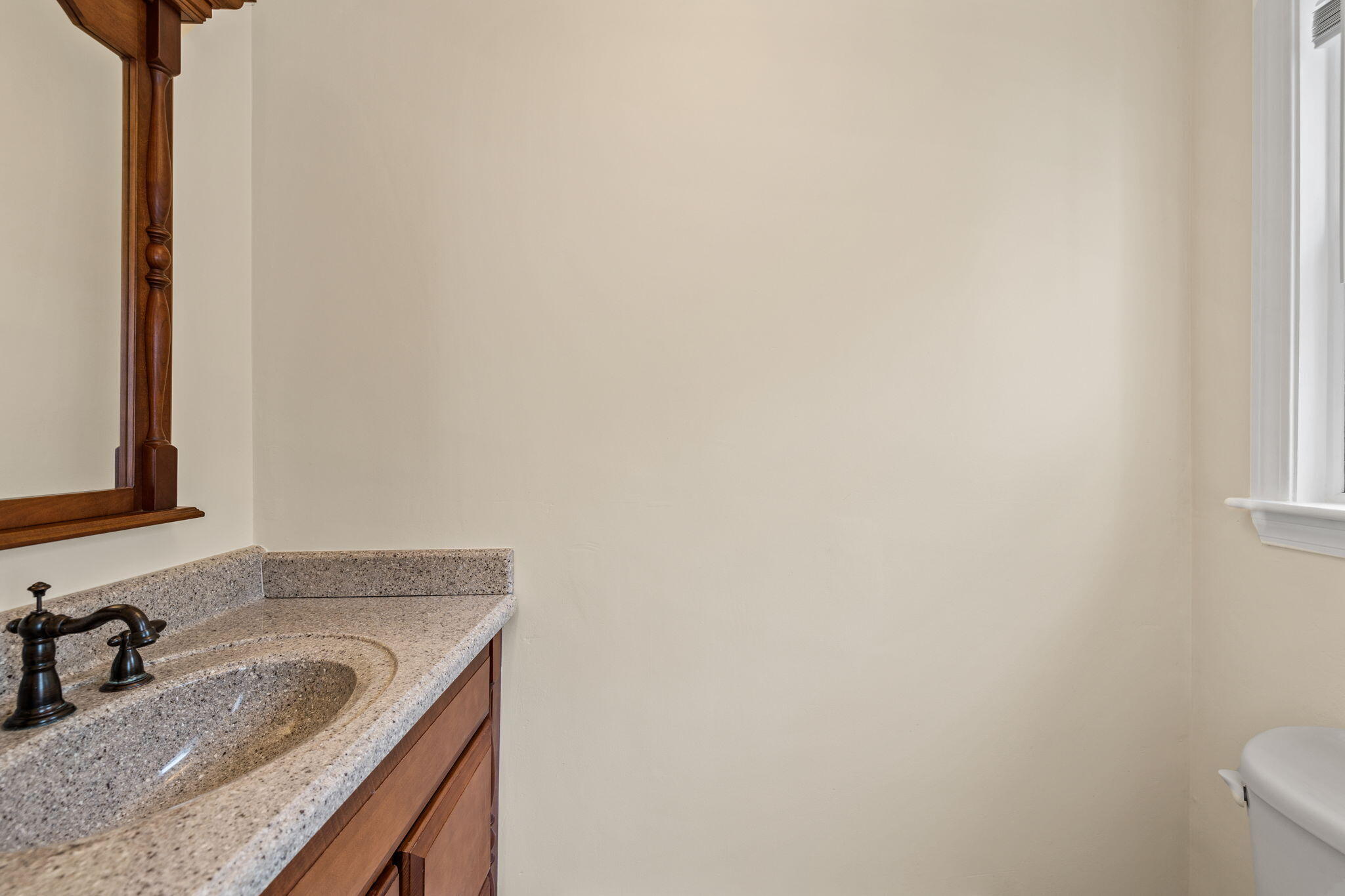 21 Heather Hill Road Buzzards Bay, MA 02532 - Photo 14 of 32 a bathroom with a granite countertop sink and a toilet